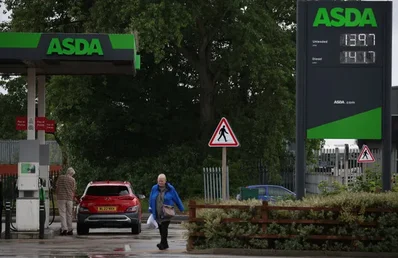 Asda annual profit falls 33 percent amid price cuts