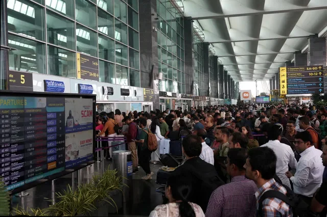 Passengers at Kempegowda International Airport in Bengaluru, India, using IndiGo ticketing kiosks in December 2025. Photo: REUTERS/Priyanshu Singh