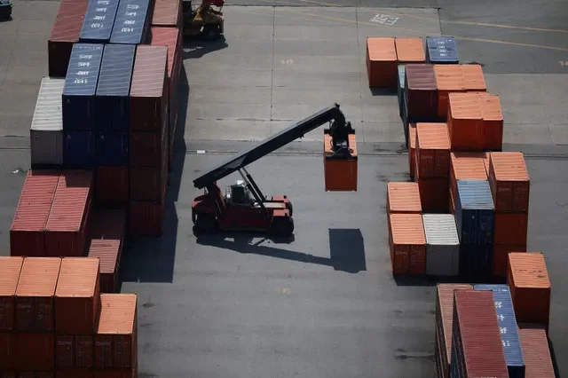 Cargo containers stacked at Pyeongtaek port in South Korea during April 2025. REUTERS/Kim Hong-Ji/File Photo