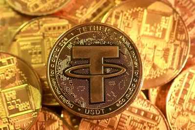 Tether เลิกจ้างเทรดเดอร์ทอง 2 รายหลังราคาทองคำโลกปรับตัวลง