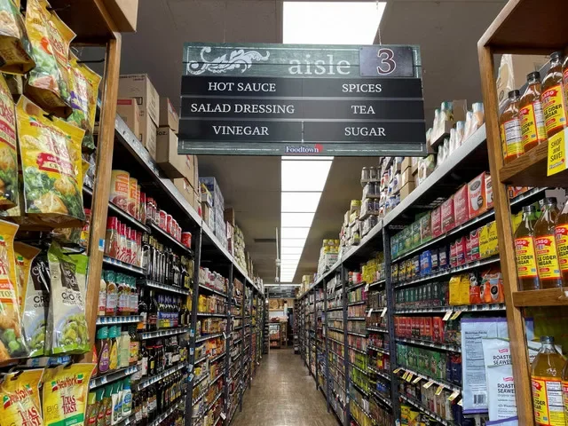 A grocery store aisle in Brooklyn, New York, showing various food products on shelves. REUTERS/Siddharth Cavale