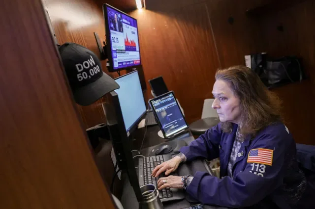 A professional monitors market activity on the floor of the New York Stock Exchange during a trading session in March 2026. REUTERS/Jeenah Moon