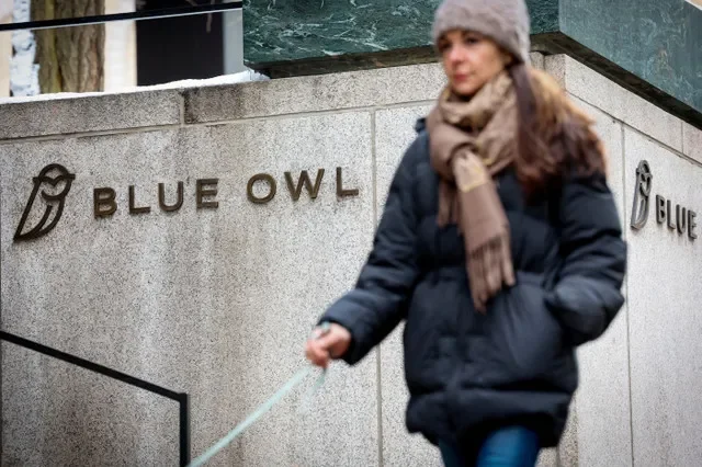 The Blue Owl Capital logo is visible on an office building located in midtown Manhattan, New York City, taken on February 24, 2026. REUTERS/Brendan McDermid