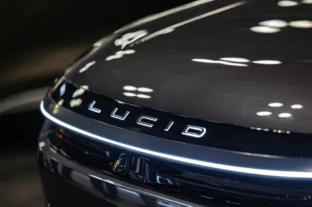 A close-up of the Lucid emblem displayed on a vehicle at the New York International Auto Show. REUTERS/Jeenah Moon/File Photo