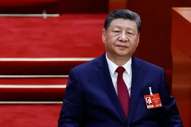 O presidente chinês Xi Jinping participa da sessão de encerramento do Congresso Nacional do Povo (NPC) no Grande Salão do Povo em Pequim, China, em 12 de março de 2026. REUTERS/Tingshu Wang