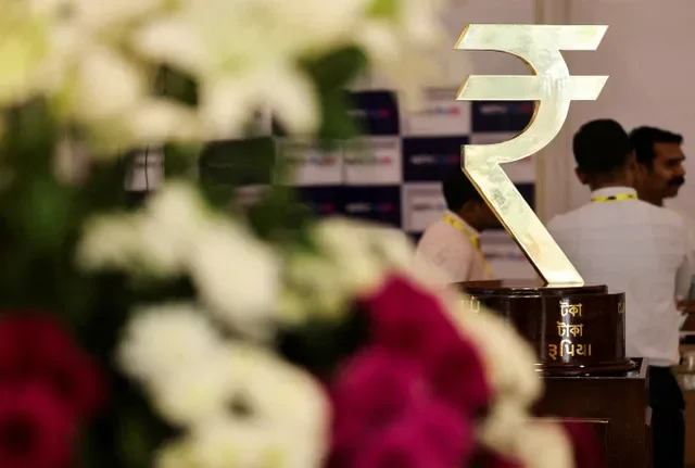 The Indian Rupee symbol displayed at the Reserve Bank of India headquarters in Mumbai. REUTERS/Francis Mascarenhas/File Photo