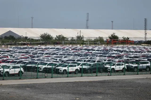 A large collection of new vehicles parked in a storage facility in Shanghai, China, as seen in September 2025. REUTERS/Go Nakamura/File Photo