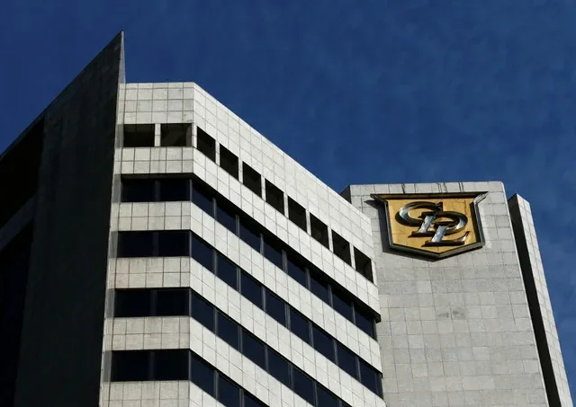 A City Developments Limited logo displayed on a corporate building in Singapore. REUTERS/Edgar Su/File Photo