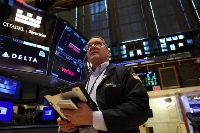 A trader monitors market activity on the floor of the New York Stock Exchange on April 8, 2026. REUTERS/Brendan McDermid