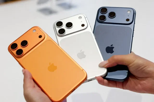 A customer views the iPhone 17 series at a retail store in Taipei, Taiwan. REUTERS/Ann Wang/File Photo