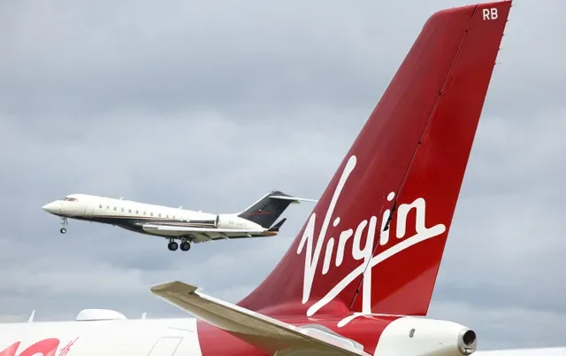 Branding for Virgin Atlantic is displayed on a tail fin during the Farnborough International Airshow in Britain, July 22, 2024. Photo: REUTERS/Toby Melville