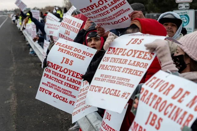 A group of JBS meatpacking employees participating in a strike in Greeley, Colorado, during March 2026. REUTERS/Cheney Orr/File Photo