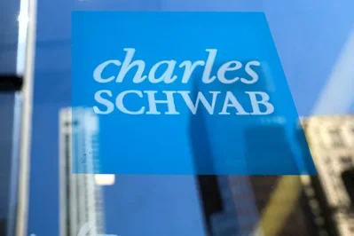 Charles Schwab atinge lucro recorde e terá criptomoedas
