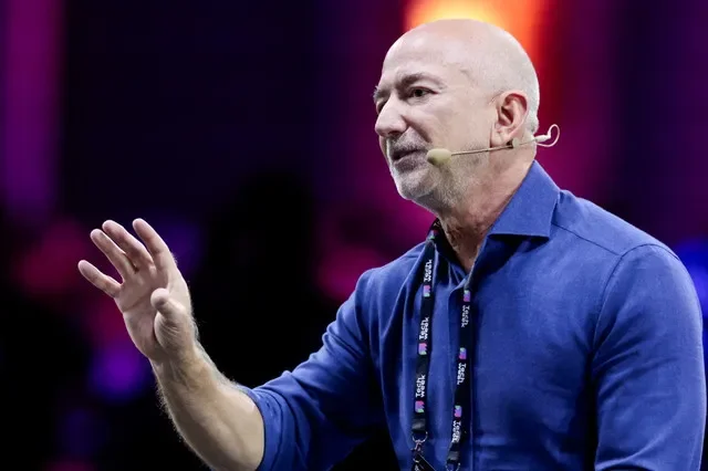 Amazon founder Jeff Bezos addresses the audience during a panel discussion at Italian Tech Week 2025 in Turin. REUTERS/Remo Casilli