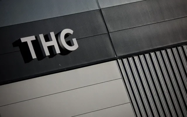 Signage on a THG warehouse building in Manchester, United Kingdom, as seen in early 2022. REUTERS/Phil Noble/File Photo