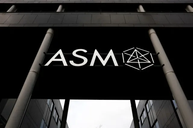 The logo of ASM, a Dutch semiconductor equipment supplier, is seen at its headquarters in Almere, Netherlands. REUTERS/Piroschka van de Wouw/File Photo