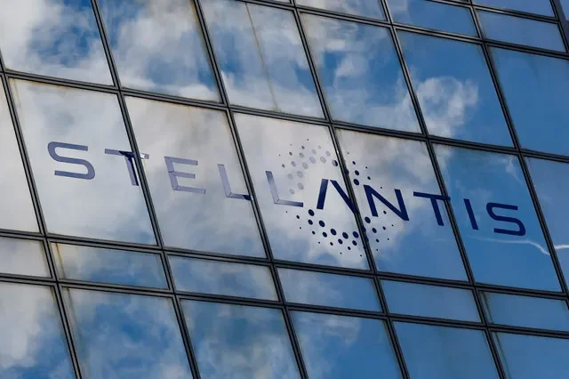 The Stellantis corporate logo displayed on the company's facility in Poissy, France. REUTERS/Stephanie Lecocq/File Photo