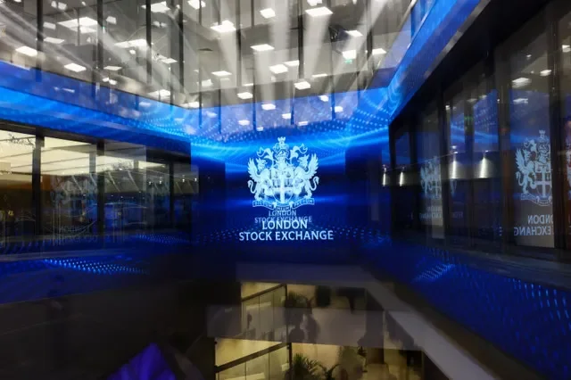 The London Stock Exchange logo is pictured on a digital display at the company's corporate offices in London, United Kingdom. REUTERS/Jack Taylor
