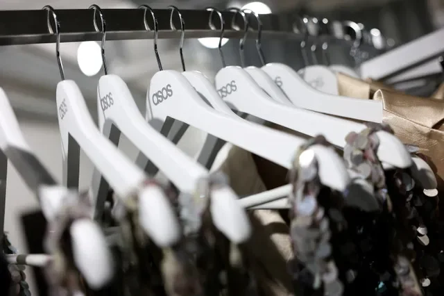 A selection of garments on display at an ASOS temporary retail location in London, November 2025. REUTERS/Hannah McKay