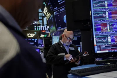 US Futures Rise on Strong Earnings and Iran Reports