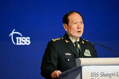 China sentences former defense chiefs to death with reprieve