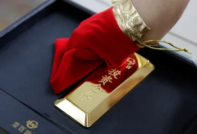 China gold production slips as investment demand rises