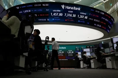Hedge Funds Buy Asian Tech Stocks at Decade High Pace