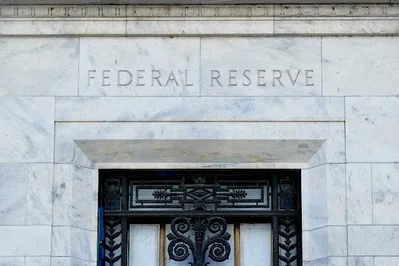 Markets bet on Fed rate hikes despite economist doubts