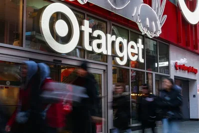 Target raised its annual sales forecast to 4% after reporting strong quarterly growth. Executives remain cautious as rising fuel costs stretch consumer budgets.