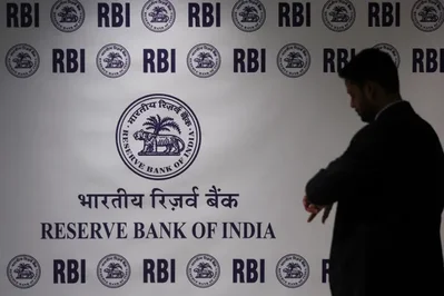 RBI Intervenes with Heavy Dollar Sales to Support Rupee