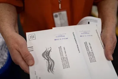 US judge declines to block Trump's mail-in voting order