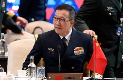 Chinese Defence Minister Dong Jun missed the Singapore security summit for the second year in a row, opting to send a delegation of researchers instead. U.S. Defense Secretary Pete Hegseth noted the absence while calling for open communication to address regional maritime and aerial tensions.
