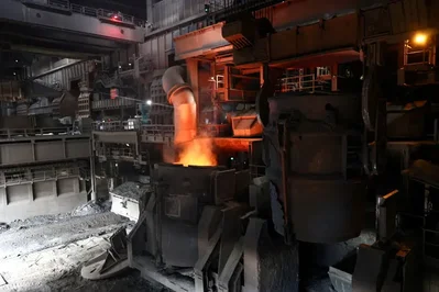 Euro Zone Factory Growth Slows as Input Costs Surge