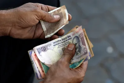RBI intervention limits rupee losses and forward premiums
