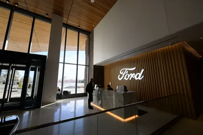 Thirteen Michigan-based companies made the latest Fortune 500 list as Ford Motor Co. surpassed General Motors in revenue. The total number of firms from the state declined from last year following several high-profile mergers and acquisitions.