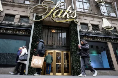 A Houston judge approved the luxury retailer's restructuring plan to eliminate equity and hand control to senior lenders. The company will emerge with 49 locations and significantly lower debt after resolving vendor disputes and closing more than half of its Saks Fifth Avenue stores.