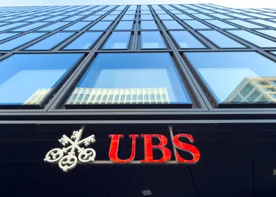 Legislators are discussing a reduction in the capital backing required for UBS foreign units from 100% to around 70% or 80%. This potential compromise could save the bank billions of dollars compared to the initial government proposal and aims to balance financial stability with global competitiveness.