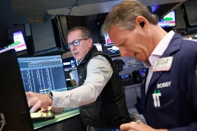 US stock futures pared losses after May inflation data rose 4.2 percent in line with estimates. The report tempered bets on further Federal Reserve tightening.