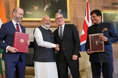 The India-UK Comprehensive Economic and Trade Agreement took effect on Wednesday, eliminating duties on most Indian exports and providing phased tariff reductions for British automobiles. The deal expands market access across 137 service sub-sectors and includes a convention to exempt eligible Indian professionals from certain insurance contributions.