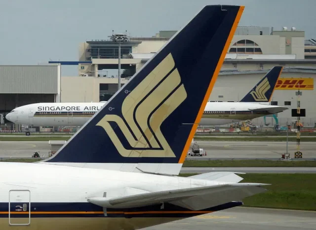 新加坡航空公司的飛機停在新加坡樟宜機場的停機坪上,攝於 2020 年 12 月 8 日。路透社/Edgar Su/檔案照