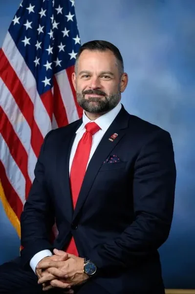 U.S. Representative Cory Mills has agreed to a four-person Republican primary debate on August 5 at the Brannon Center in Volusia County. The incumbent faces challengers Sarah Ulrich, Ryan Elijah, and Michael Johnson amid reports of a federal investigation into his conduct.