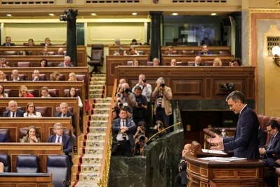 Spain's lower house voted 176-166 to reject the government's 2027 spending plan, marking a significant setback for Prime Minister Pedro Sanchez. The minority coalition continues to struggle with a fragmented parliament, forcing the country to rely on rolled-over accounts from 2023.