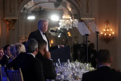 President Donald Trump addressed the White House Correspondents Association dinner on Friday following a three-month delay caused by a shooting incident in April. The president mixed jokes with sharp criticism of his political adversaries and the media while asserting his administration remains the most transparent in history.