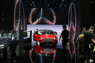 Mercedes-Benz reported a 22% increase in second-quarter operating profit to 1.5 billion euros, driven by aggressive cost-cutting and strong performance in its vans division. The automaker lowered its full-year revenue and sales guidance due to persistent market challenges in China and rising competition.