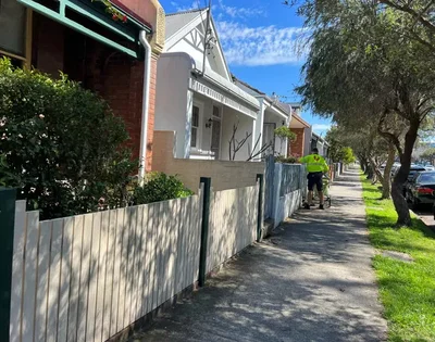 Home prices in Sydney and Melbourne have fallen nearly 5% this year as rising interest rates and tax changes curb buyer demand. The downturn is impacting consumer spending and state revenue while mortgage inquiries and bank shares experience significant declines.