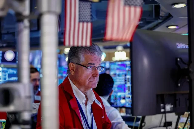 A trader works on the floor of the New York Stock Exchange (NYSE) in New York City, U.S., July 30, 2026. REUTERS/Jeenah Moon