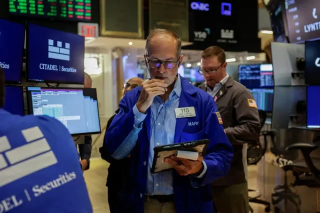 A trader works on the floor of the New York Stock Exchange (NYSE) in New York City, U.S., August 19, 2026. REUTERS/Jeenah Moon