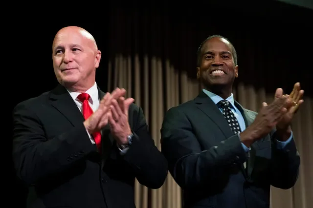 Michigan Rep. Jay DeBoyer, R-Clay Twp., left, and Michigan gubernatorial candidate John James pose for a photo at the Michigan Republican Party state nominating convention at Soaring Eagle Casino in Mount Pleasant on Aug. 22, 2026.