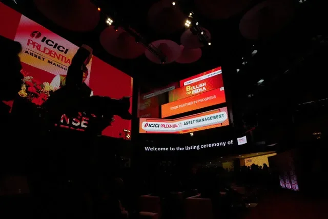 A cameraperson works during the listing ceremony of ICICI Prudential AMC at the National Stock Exchange (NSE) headquarters in Mumbai, India, December 19, 2025. REUTERS/Hemanshi Kamani