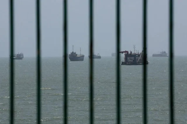 Vessels in the Strait of Hormuz are visible near the beach of Bandar Abbas, Iran, August 26, 2026. Majid Asgaripour/WANA (West Asia News Agency) via REUTERS